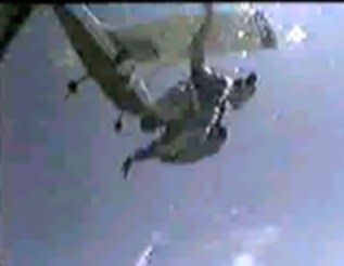 Mike being pushed out of the plane